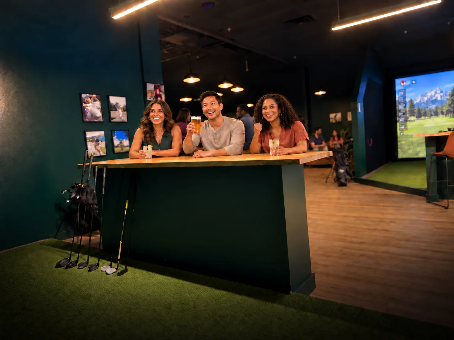 Three friends enjoying drinks and reacting to a shot from the bay counter